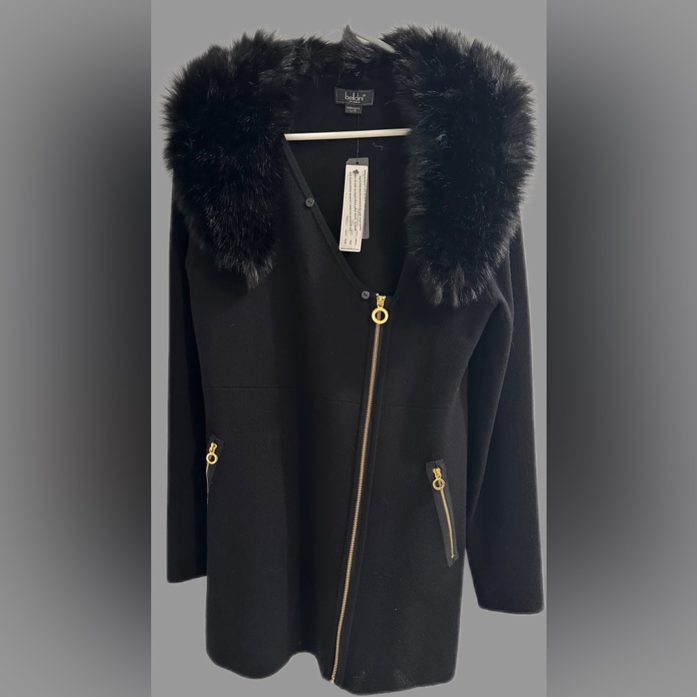 Black jacket with removable fur piece. Never worn